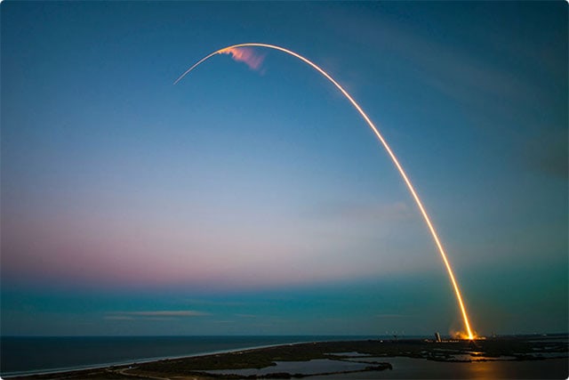 long exposure shot of a rocket taking off