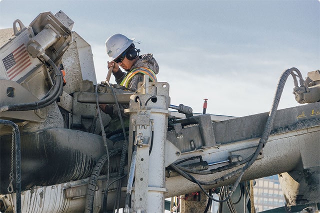 construction worker operating a machine